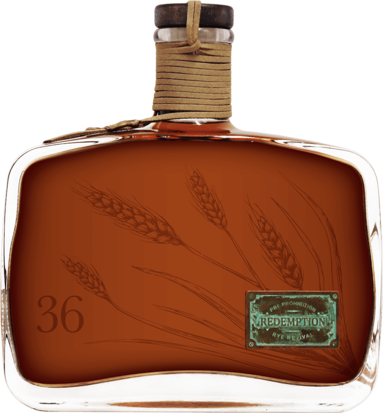 Bottle of 36 year aged Redemption whiskey on table - Redemption Whiskey